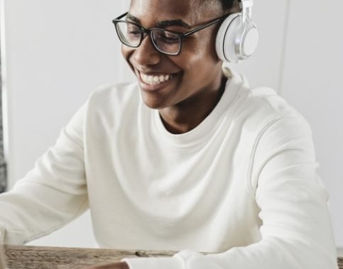 https___elements.envato.com_young-african-man-using-laptop-computer-while-wear-3CYX4F9-1.jpg